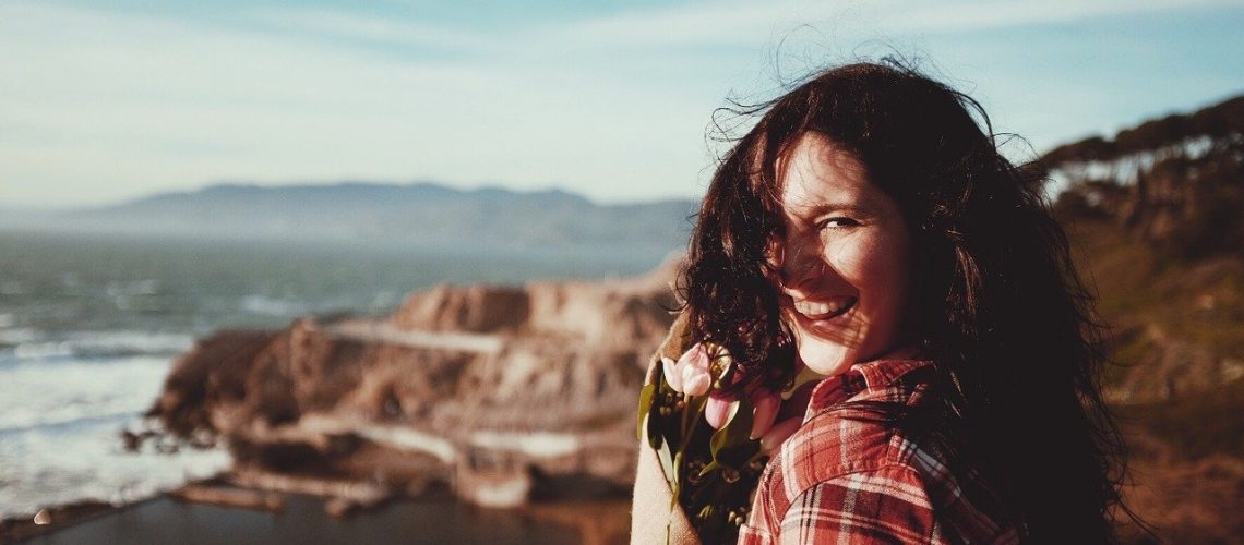 woman, laughter, bouquet of flowers